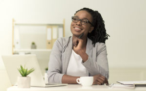 woman with laptop and coffee